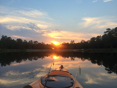 orange kayak floating thumbnail