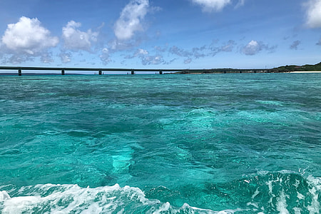 photo of blue sea during day time thumbnail