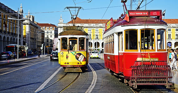 people riding on yellow and white trum thumbnail