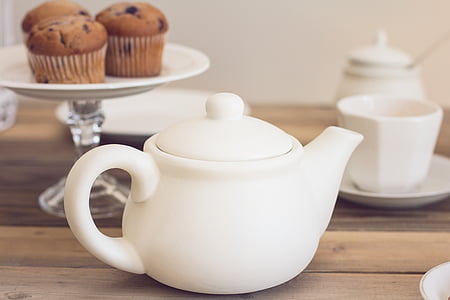 white ceramic teapot near footed cupcake stand thumbnail