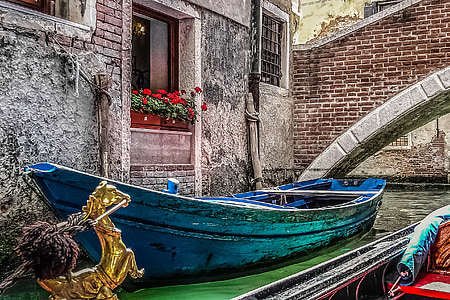 blue boat in the water thumbnail