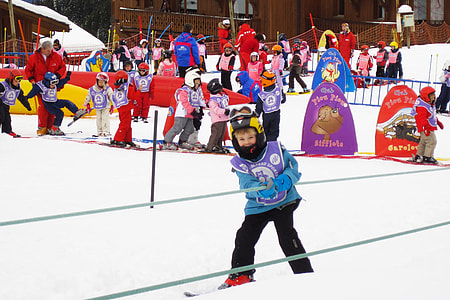 toddler learning how to ski at daytime thumbnail