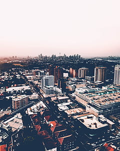 aerial photography of building under cloudy sky during daytime thumbnail