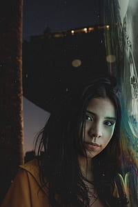 woman taking photo through the reflection of mirror thumbnail