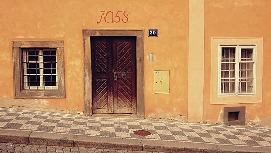 brown concrete building and sidewalk thumbnail