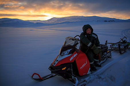 man riding snowmobile thumbnail