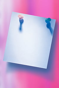 pink and blue pins on paper thumbnail