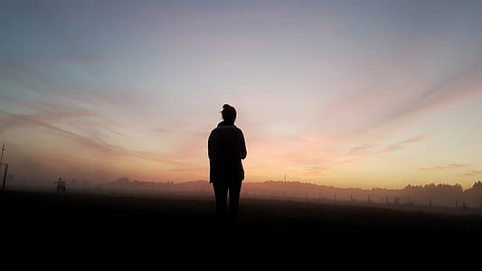 man standing over sunset thumbnail