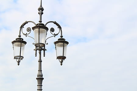 lamp post under gray sky thumbnail