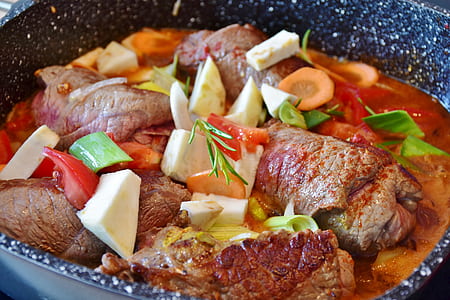 cooked meat with vegetables on bowl thumbnail