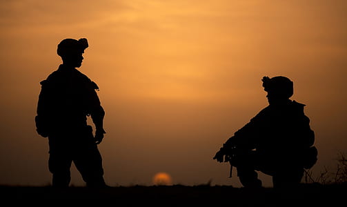 photo of two soldiers during sunset thumbnail