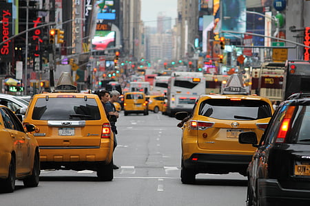 photo of yellow and black cars thumbnail