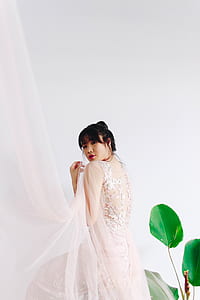woman wearing white lace wedding dress thumbnail
