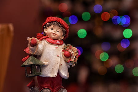 child carrying lantern figurine thumbnail