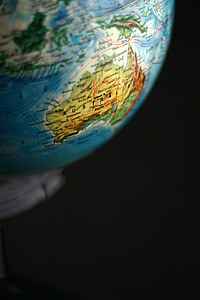 selective focus photography of globe focused Australia thumbnail