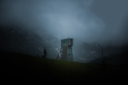 gray electric tower during nighttime illustration thumbnail