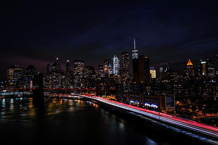 city during night time timelapse photography thumbnail