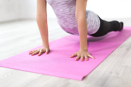woman performing yoga thumbnail