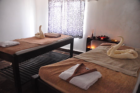 filed white cloth on top of bed thumbnail