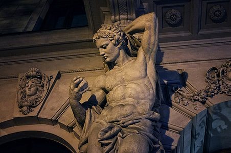 topless man concrete statue thumbnail