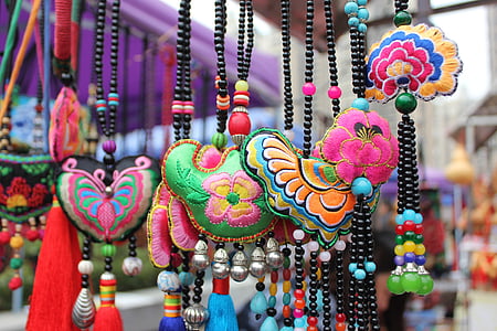 selective focus photography of beaded assorted-color necklace lot thumbnail