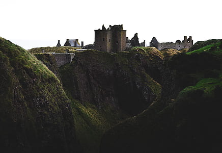 brown concrete castle on top of mountain thumbnail