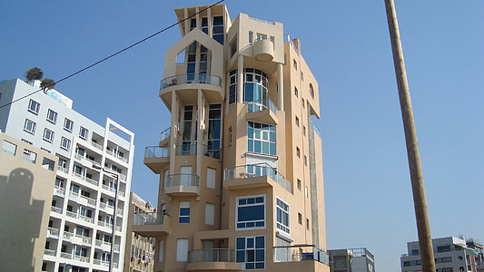 beige building during daytime thumbnail