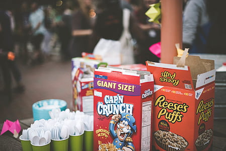 assorted food boxes beside cups thumbnail