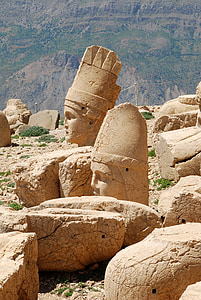 brown concrete statue remains during daytime thumbnail