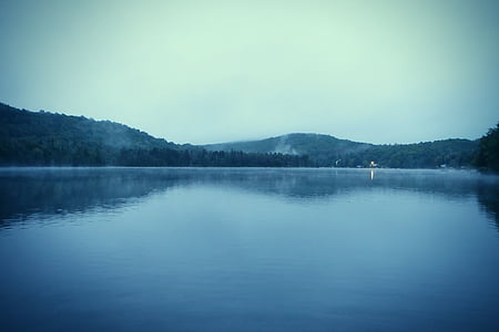 lake in the middle of the mountain thumbnail