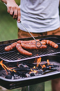 Pork and sausage on the grill thumbnail