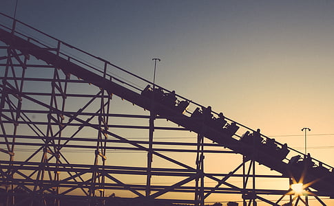 silhouette of roller coaster during dusk thumbnail