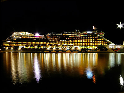 cruise ship on body of water thumbnail