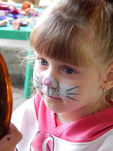 girl with cat makeup on face thumbnail