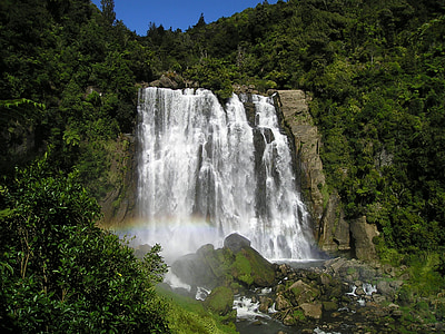 clear waterfall with green trees thumbnail