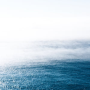 body of water under fog thumbnail