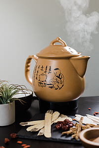 brown teapot on table thumbnail