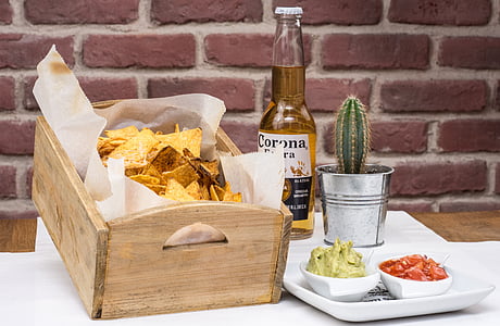 rectangular brown wooden crate beside Corona Extra beer bottle thumbnail
