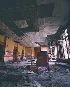 red chair on abandoned building thumbnail