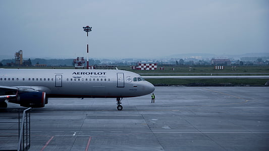 gray airplane on the airport thumbnail
