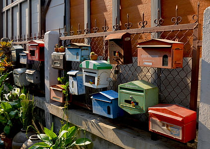 assorted-color mail boxes thumbnail