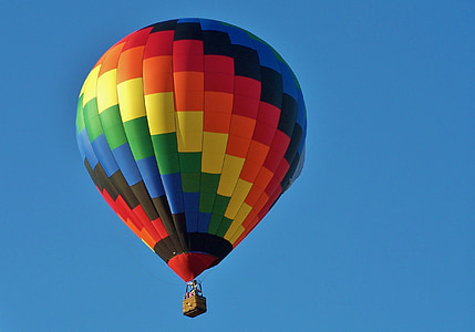 multicolored hot air balloon under blue sky thumbnail