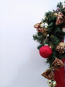 green and red christmas tree with baubles thumbnail