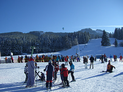 group of people playing on snow field thumbnail