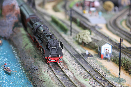 tilt shift photography black and red locomotive thumbnail