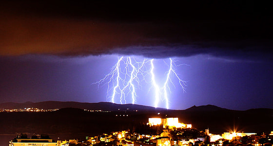 lightning striking town thumbnail