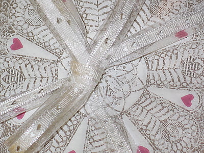 white and pink floral textile thumbnail