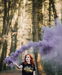 woman holding purple smokescreen thumbnail