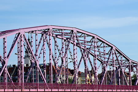 red metal bridge during daytime thumbnail