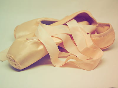 pair of brown leather ballet shoes against white background thumbnail